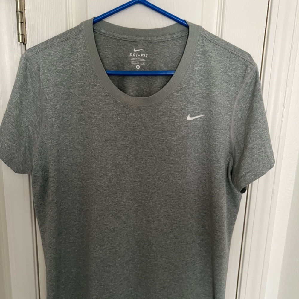 2 Nike ladies extra large, dry fit tops